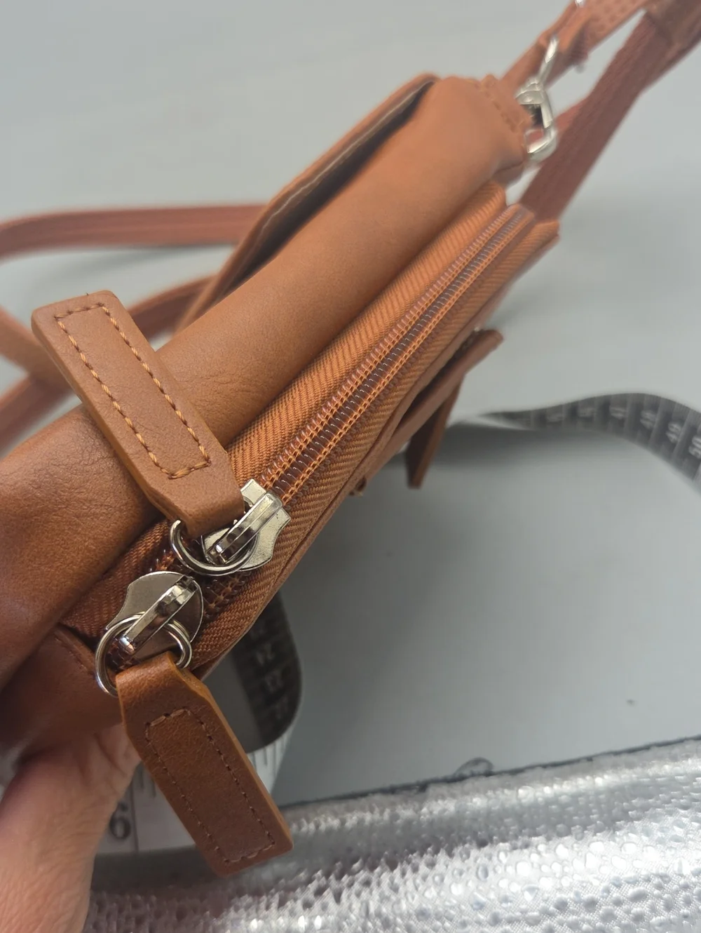 Hammacher Schlemmer • Wearable crossbody leather wallet
